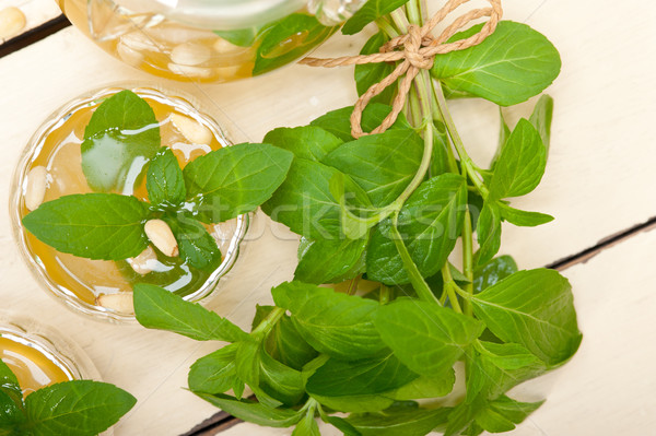 Arab traditional mint and pine nuts tea Stock photo © keko64