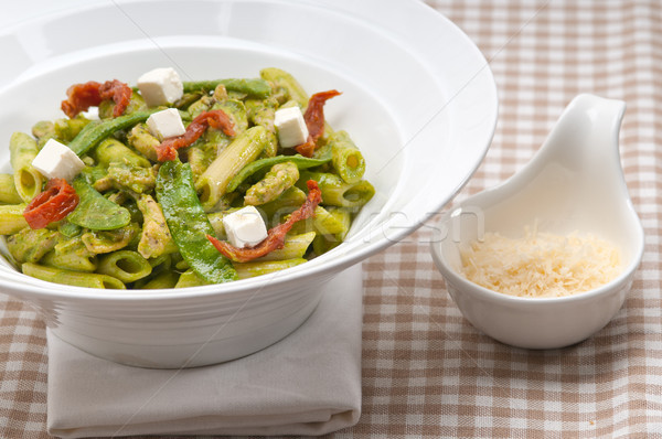 Italian penne pasta with sundried tomato and basil Stock photo © keko64