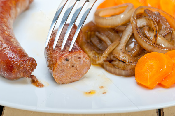 Rundvlees worstjes gekookt ijzer wortel ui Stockfoto © keko64