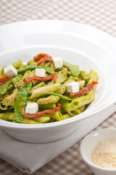 Italian penne pasta with sundried tomato and basil Stock photo © keko64