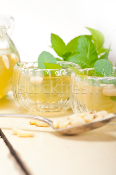 Arab traditional mint and pine nuts tea Stock photo © keko64