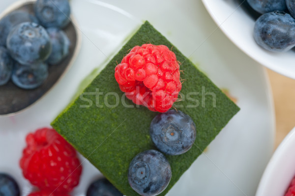 Stock photo: green tea matcha mousse cake with berries