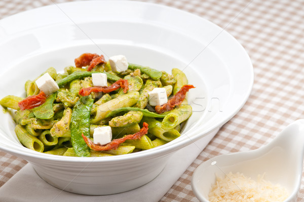 Italian penne pasta with sundried tomato and basil Stock photo © keko64