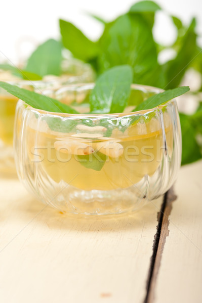 Arab traditional mint and pine nuts tea Stock photo © keko64