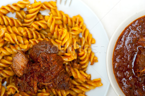 Stock photo: fusilli pasta with neapolitan style ragu meat sauce