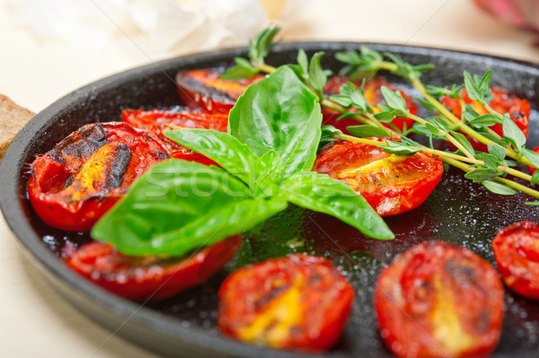 baked cherry tomatoes with basil and thyme Stock photo © keko64