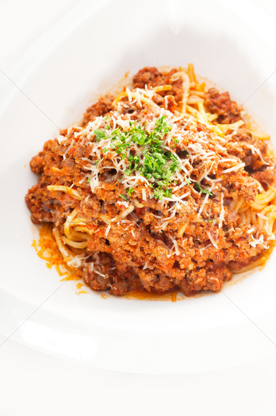 spaghetti with bolognese sauce and fresh vegetables on backgroun Stock photo © keko64