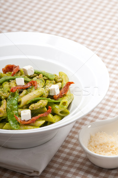 Italian penne pasta with sundried tomato and basil Stock photo © keko64