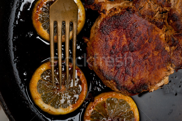 pork chop seared on iron skillet Stock photo © keko64
