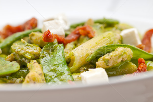 Italian penne pasta with sundried tomato and basil Stock photo © keko64