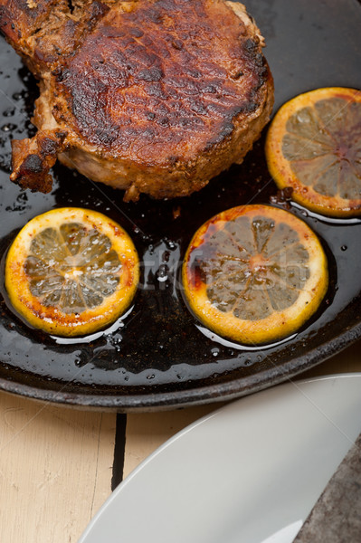 pork chop seared on iron skillet Stock photo © keko64