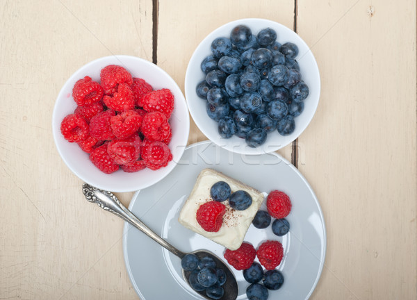 Stock photo: fresh raspberry and blueberry cake