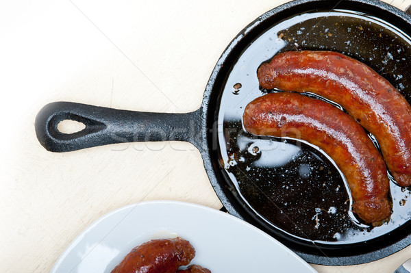 beef sausages cooked on iron skillet  Stock photo © keko64