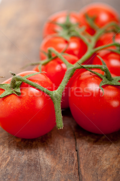 Stock photo: fresh cherry tomatoes on a cluster