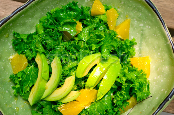 Frescos aguacate ensalada naranja alimentos Foto stock © keko64