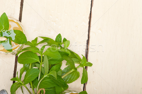 Arab traditional mint and pine nuts tea Stock photo © keko64