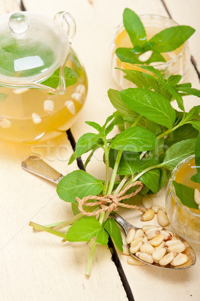 Arab traditional mint and pine nuts tea Stock photo © keko64