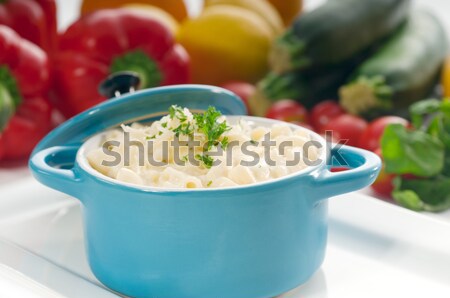 mac and cheese on a blue little clay pot Stock photo © keko64