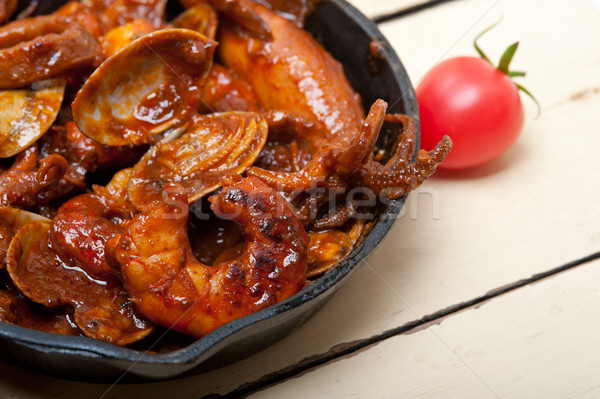 fresh seafoos stew on an iron skillet Stock photo © keko64