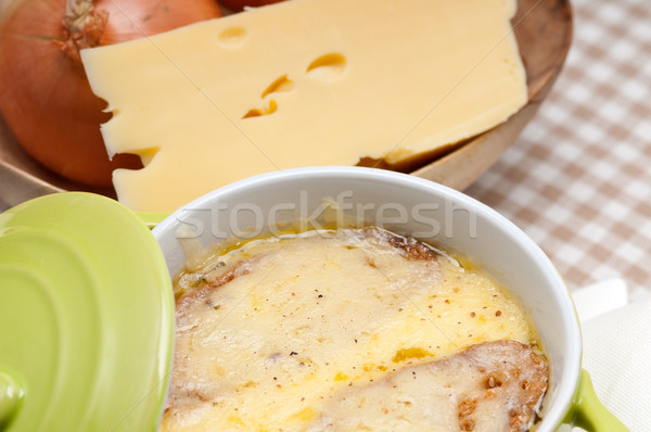 oinion soup with melted cheese and bread on top Stock photo © keko64