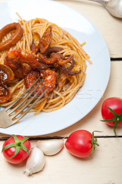 Włoski owoce morza spaghetti makaronu czerwony sos pomidorowy Zdjęcia stock © keko64