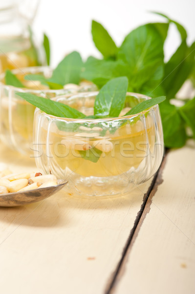 Arab traditional mint and pine nuts tea Stock photo © keko64