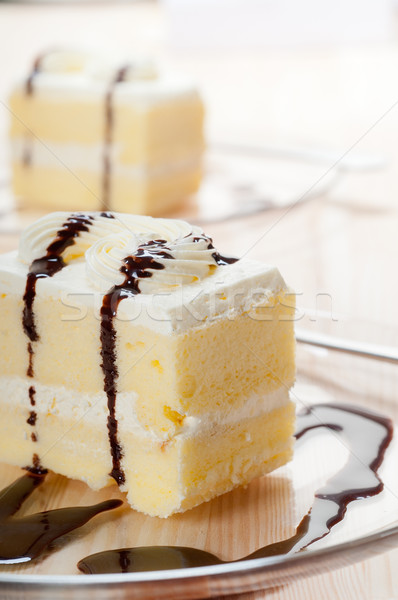 fresh cream cake closeup with chocolate sauce Stock photo © keko64