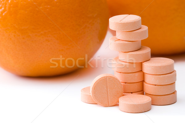 Witamina c pigułki pomarańczowy medycznych owoców muzyka Zdjęcia stock © kenishirotie