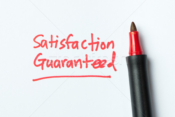 Handschrift Zufriedenheit garantieren rot Farbe Stift Stock foto © kenishirotie
