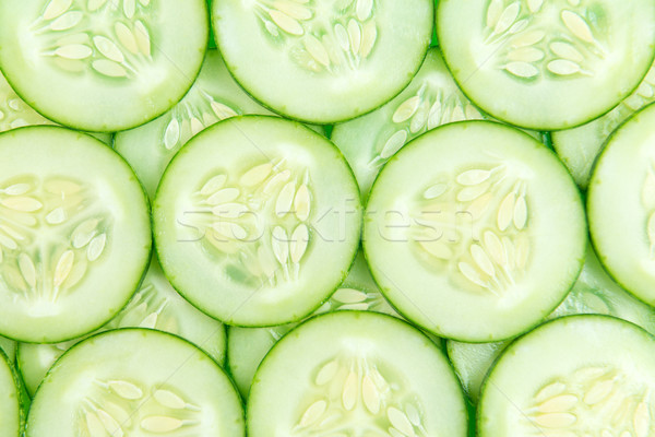 Cucumber slices background Stock photo © kenishirotie