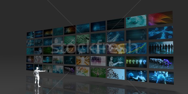 Stock photo: Man Looking into Video Wall