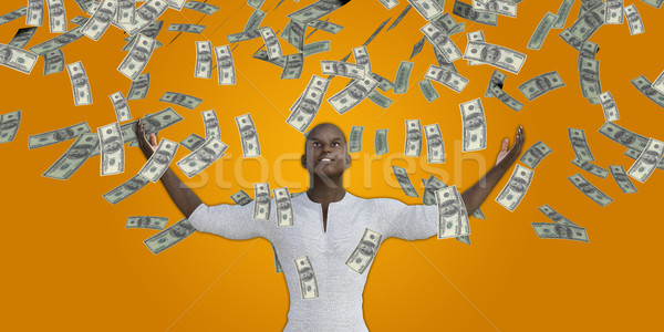 Stock photo: Black Man Catching Money Falling From the Sky