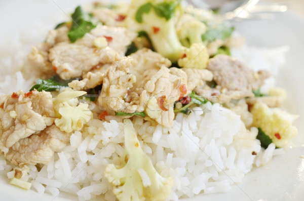 Stock photo: stir fried pork with chillies basil leaves and steam rice