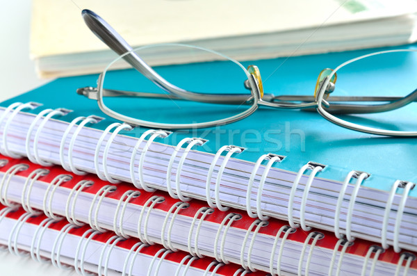 [[stock_photo]]: Portable · verres · bureau · papier · texture · livre