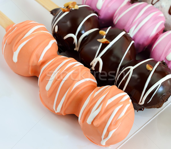 Sweet donut balls piled on a white plate Stock photo © Kheat