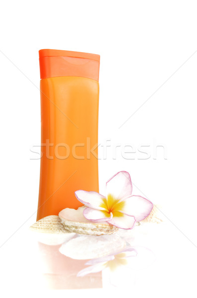 sunblock with flower and shells Stock photo © Kheat