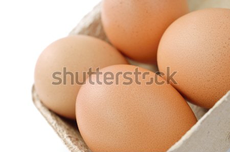 Fresh eggs with a carton box Stock photo © Kheat