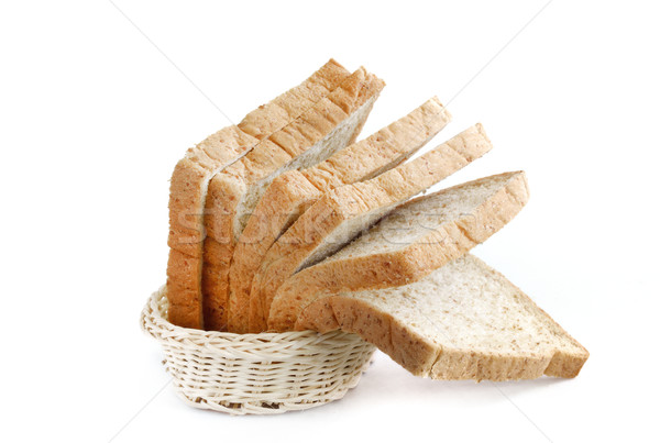 Paine integrala de grau coş alb pâine grâu proaspăt Imagine de stoc © Kheat