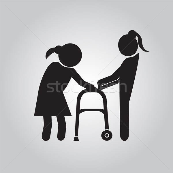 Woman helps elderly patient with a walker Stock photo © Kheat