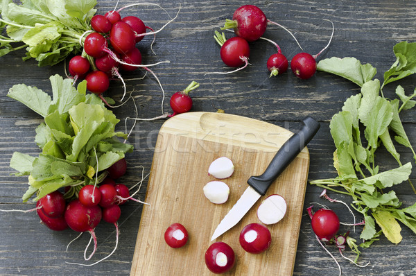 Red radish on cutting board Stock photo © Kidza