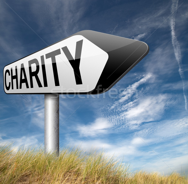 Liefdadigheid schenking geven helpen behoeftig geschenk Stockfoto © kikkerdirk