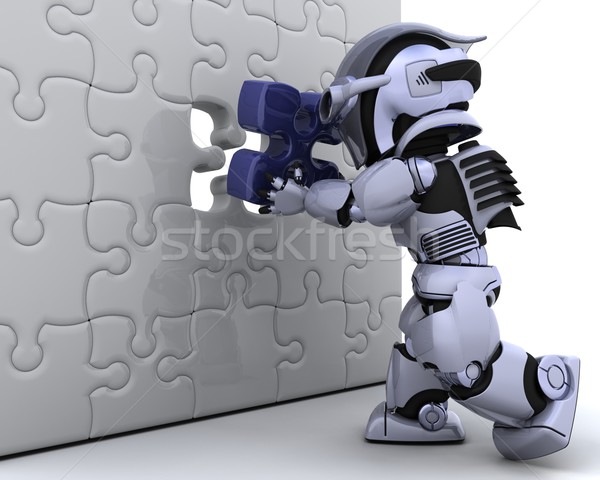 robot with the final piece of the puzzle Stock photo © kjpargeter