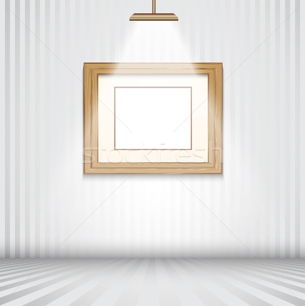 Spotlit room with empty wooden frame Stock photo © kjpargeter