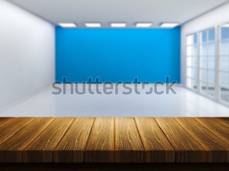 Wooden table with defocussed empty room image Stock photo © kjpargeter