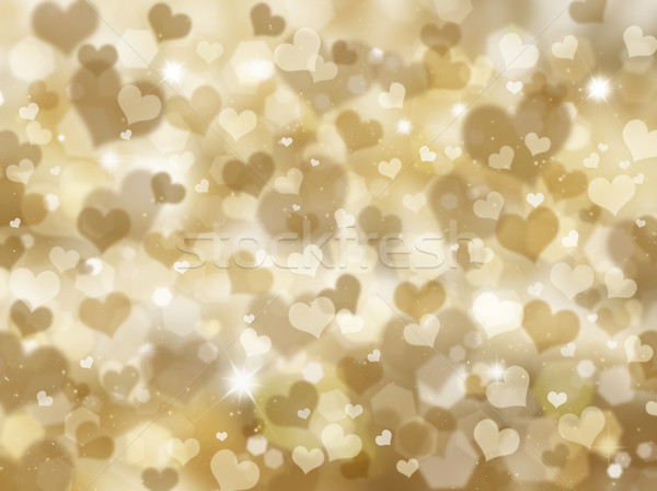 Glittery gold hearts background Stock photo © kjpargeter