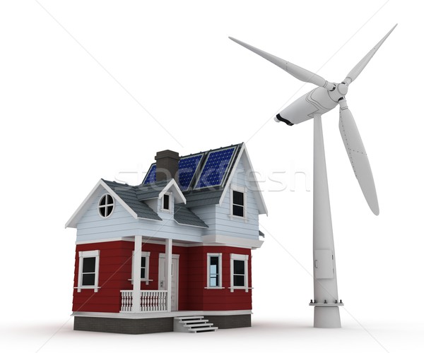 Solar panels on a house with wind turbine Stock photo © kjpargeter