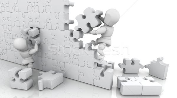 Solving jigsaw puzzle Stock photo © kjpargeter