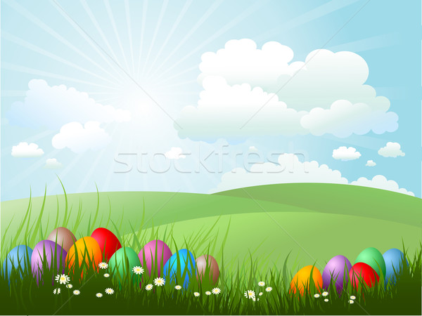 Stock photo: easter eggs in grass 