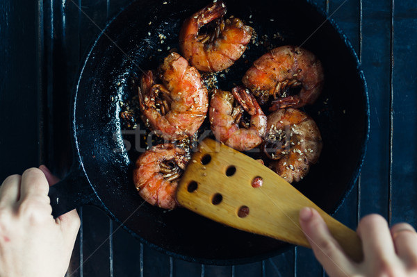 Shrimp fried with garlic and sesame seeds Stock photo © kkolosov
