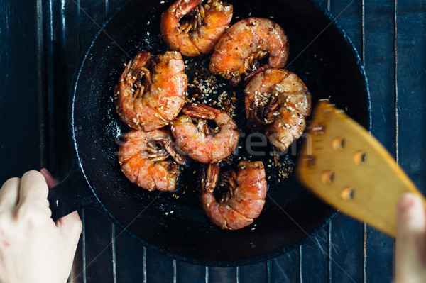 Shrimp fried with garlic and sesame seeds Stock photo © kkolosov